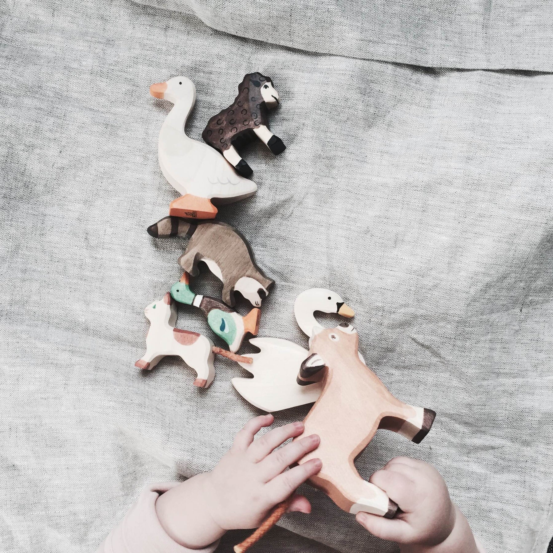 Nothing quite beats wooden animals that don't make a peep other than out of your child's imagination!