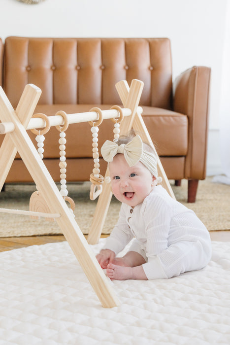 Poppyseed Play Wooden Baby Gym | Natural Frame